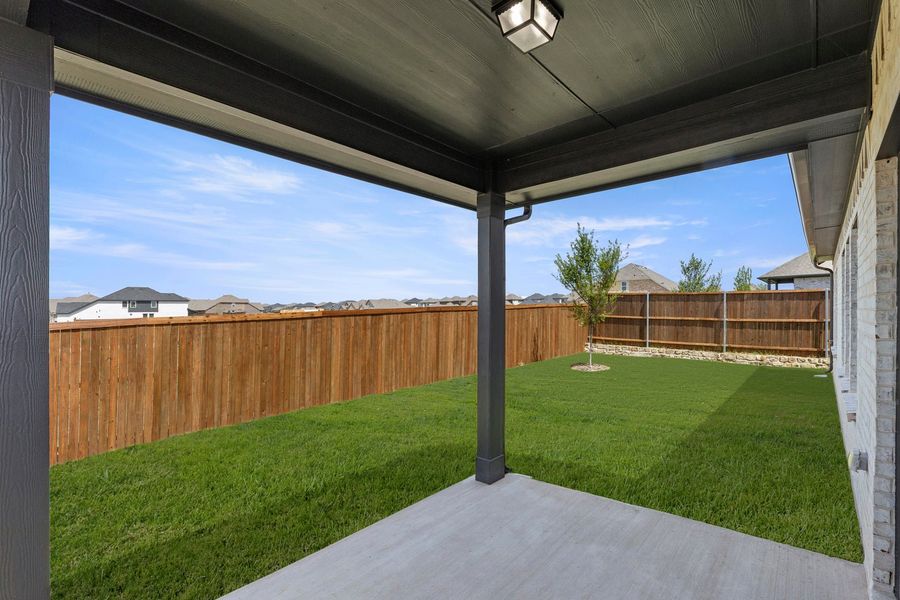 Exterior details and patio area of a home in Creekside, Royse City (Image 3). Exterior details and patio area of a home in Creekside, Royse City (Image 3).