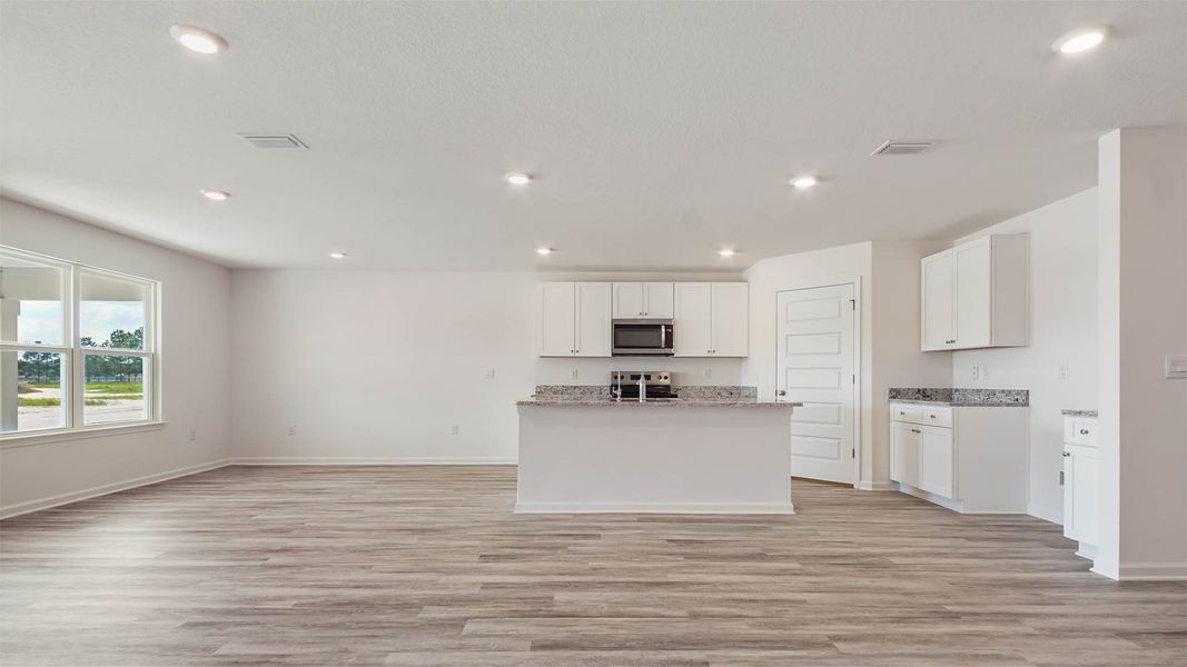 Representative furnished interior of a home built from the Ryder by D.R. Horton in Ashton Park Phase III, Freeport (Image 6).