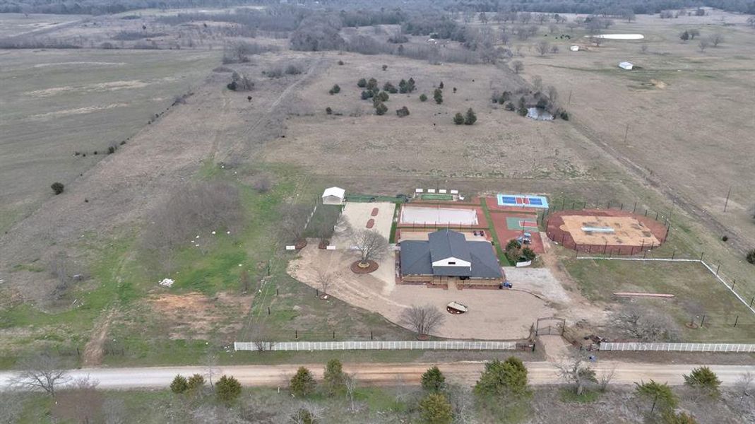 Aerial view of event center and adjoining 50+ acres.