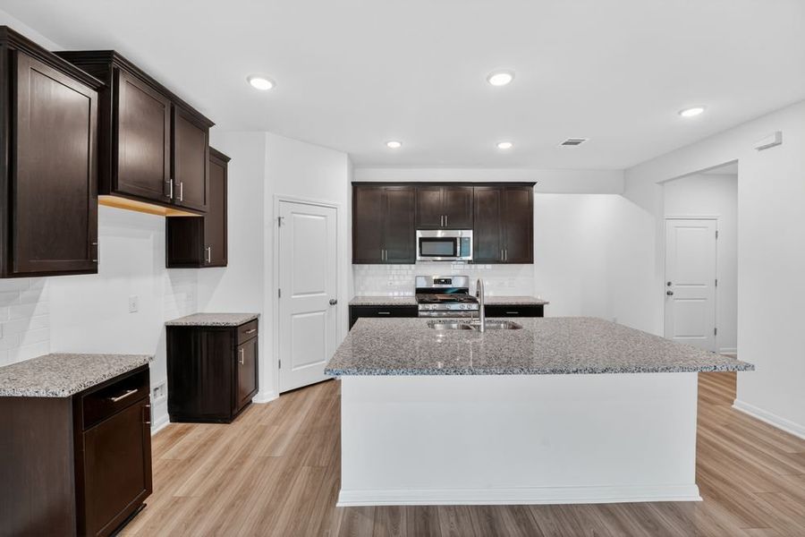 Furnished interior view inside a new home in Lisso, Pflugerville (Image 4).