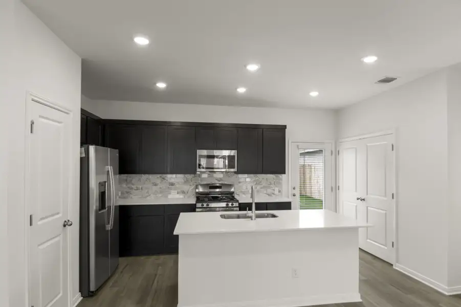 Furnished interior view inside a new home in Trace, San Marcos (Image 10).