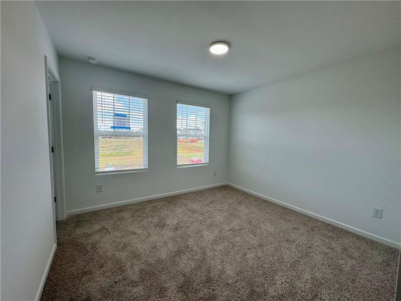 Spacious, unfurnished interior of a new home in Eastlyn Crossing, Flowery Branch (Image 17). Spacious, unfurnished interior of a new home in Eastlyn Crossing, Flowery Branch (Image 17).