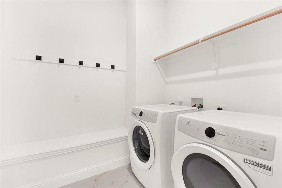 Laundry and mud room off the garage Laundry and mud room off the garage