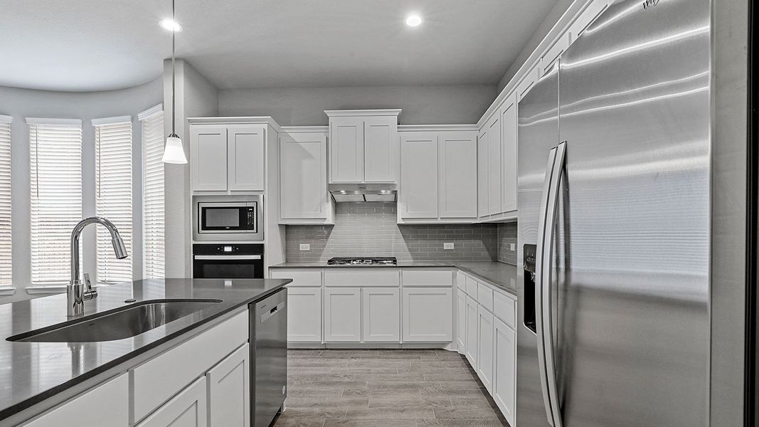 Furnished interior view inside a new home in Eagle Creek, Denton (Image 7).
