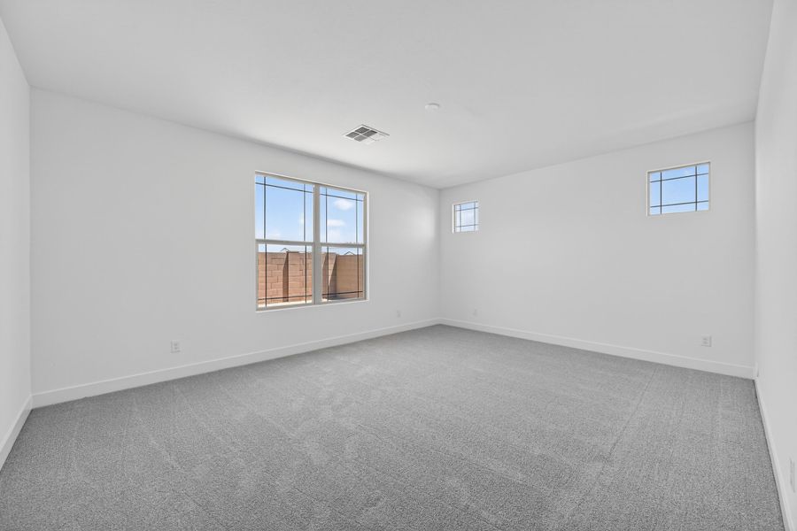 Spacious, unfurnished interior of a new home in Artisan at Asante, Surprise (Image 21).