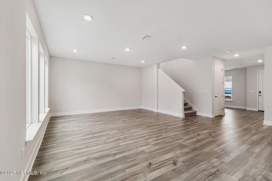 Spacious, unfurnished interior of a new home in Tributary 70', Yulee (Image 20).