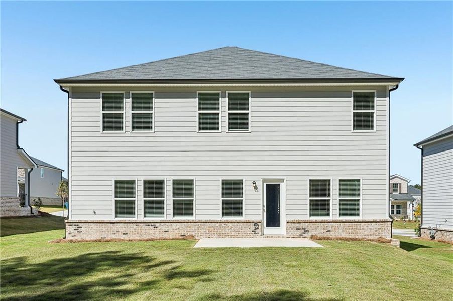 Exterior details and patio area of a home in Parkside at Grayson, Grayson (Image 2).