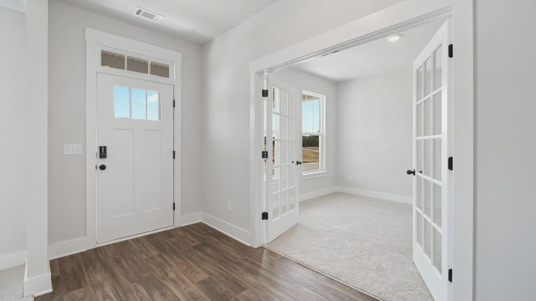 Representative furnished interior of a home built from the Stonefield - Finished Basement by DRB Homes in Pinebrook, Woodruff (Image 16).