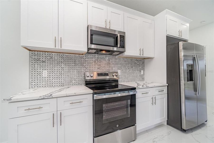 Furnished interior view inside a new home in , Port Charlotte (Image 10).