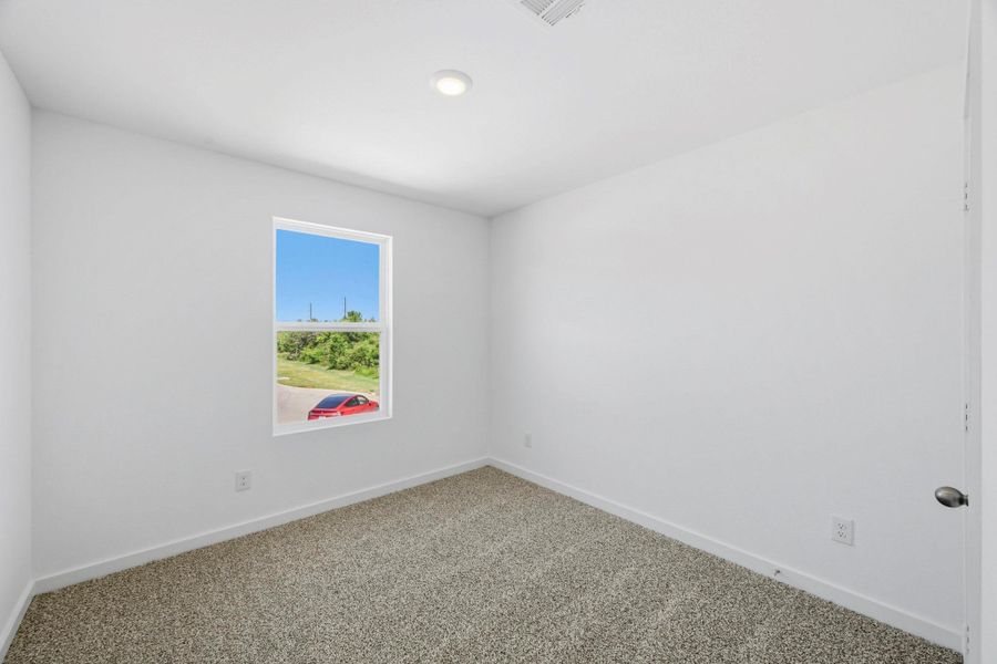 Spacious, unfurnished interior of a new home in Baron Village, Conroe (Image 11). Spacious, unfurnished interior of a new home in Baron Village, Conroe (Image 11).