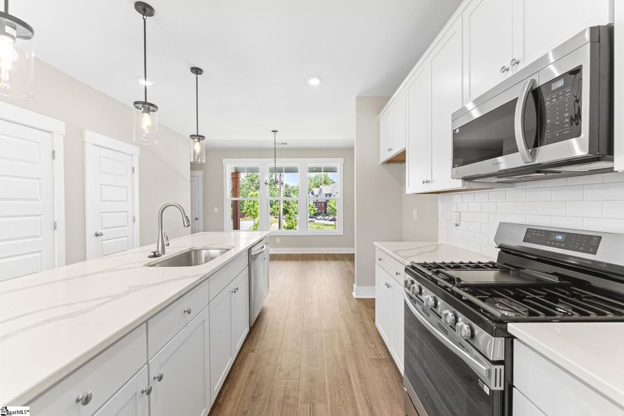 Furnished interior view inside a new home in Renaissance Place, Greenville (Image 6).