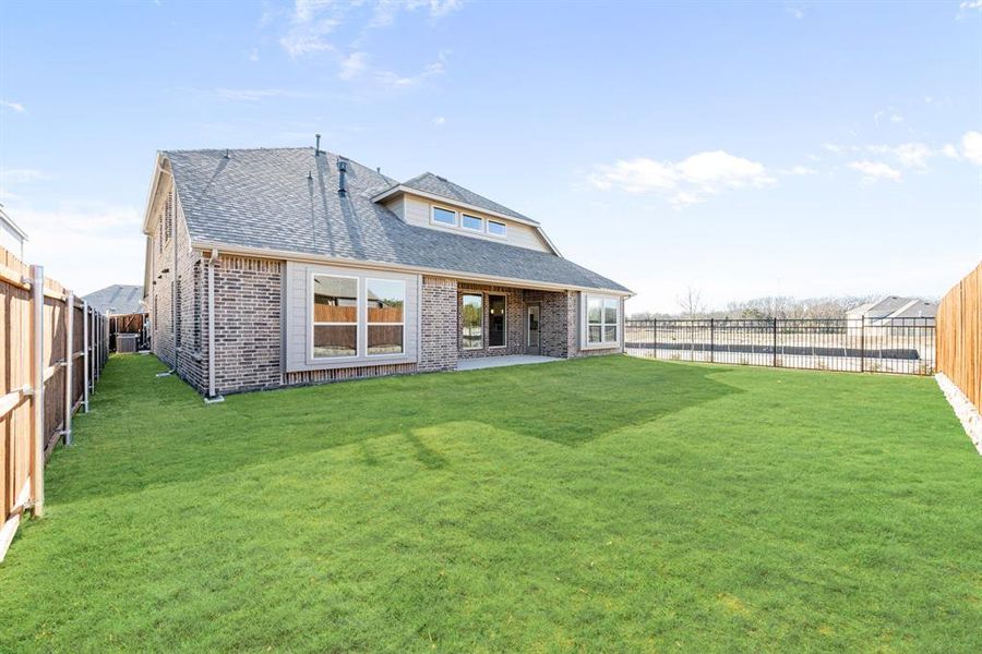 Exterior details and patio area of a home in Addison Hills Classic 60s, Cedar Hill (Image 4).