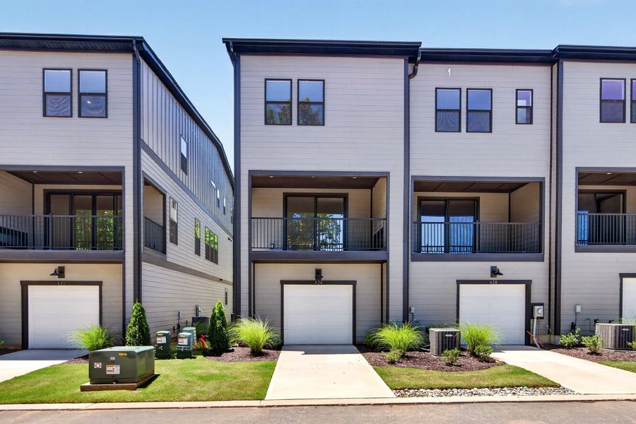 Front exterior of a new home in Old Town Village, Waxhaw, NC, highlighting curb appeal (Image 2). Front exterior of a new home in Old Town Village, Waxhaw, NC, highlighting curb appeal (Image 2).