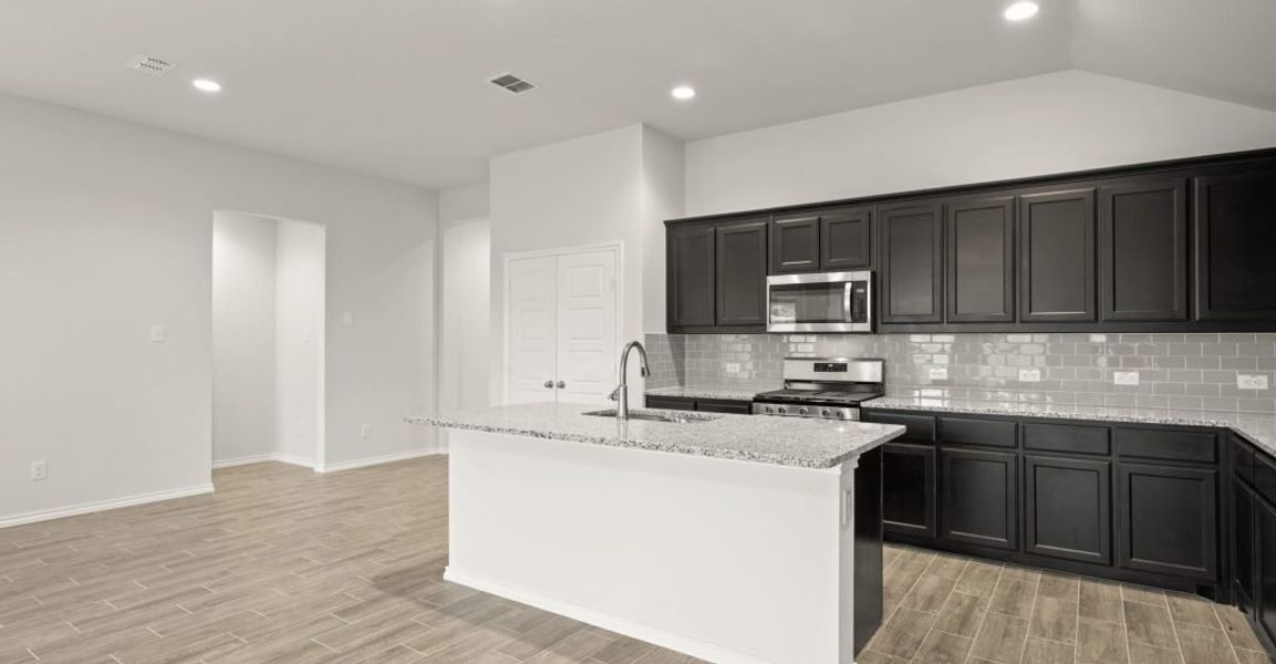 Representative exterior photo of a completed home built from the Boston by Impression Homes in Baker Farms, Cleburne, TX (Image 6).