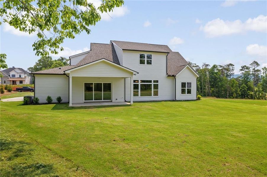 Front exterior of a new home in , Rydal, GA, highlighting curb appeal (Image 21). Front exterior of a new home in , Rydal, GA, highlighting curb appeal (Image 21).