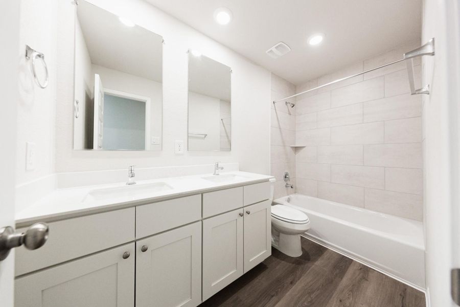 Furnished interior view inside a new home in River's Edge, Conroe (Image 9).