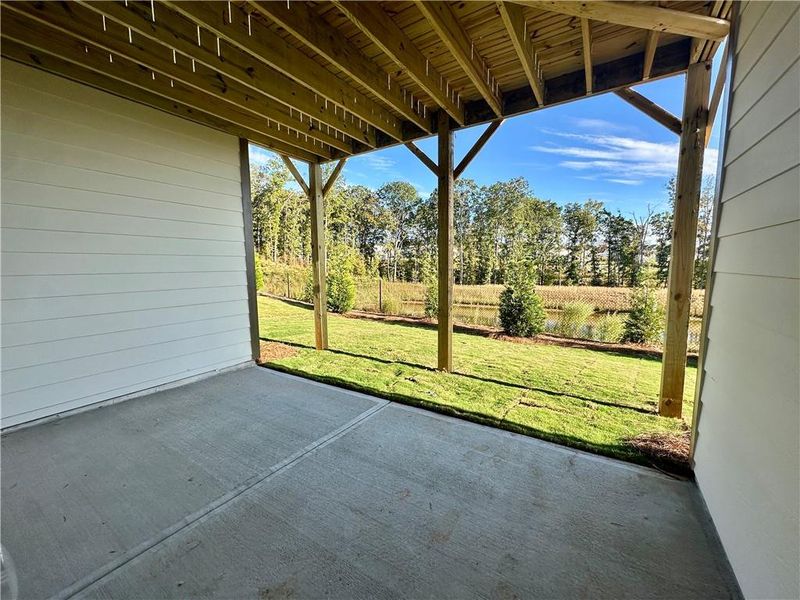 Exterior details and patio area of a home in Twin Lakes, Hoschton (Image 19).