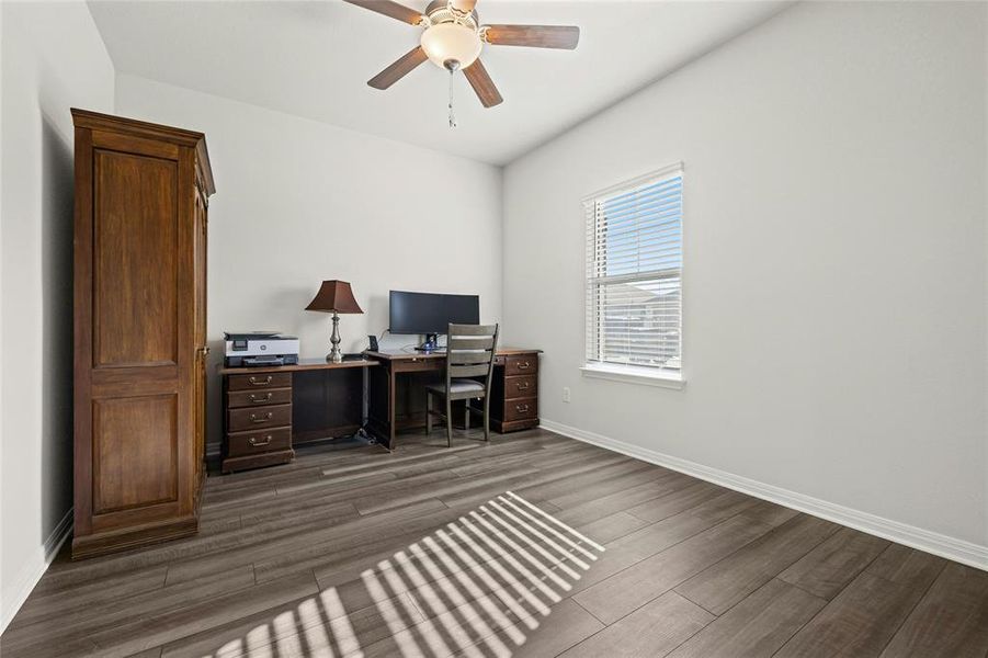 Private Office at Front of Home with Ceiling Fan