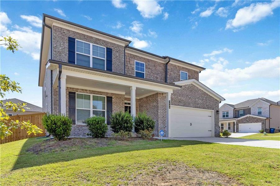 Front exterior of a new home in , Atlanta, GA, highlighting curb appeal (Image 26).