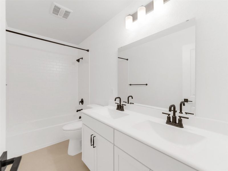 Furnished interior view inside a new home in Oakberry Trails, Waller (Image 17).