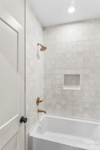 Gorgeous tile shower in the jack-and-jill bath.