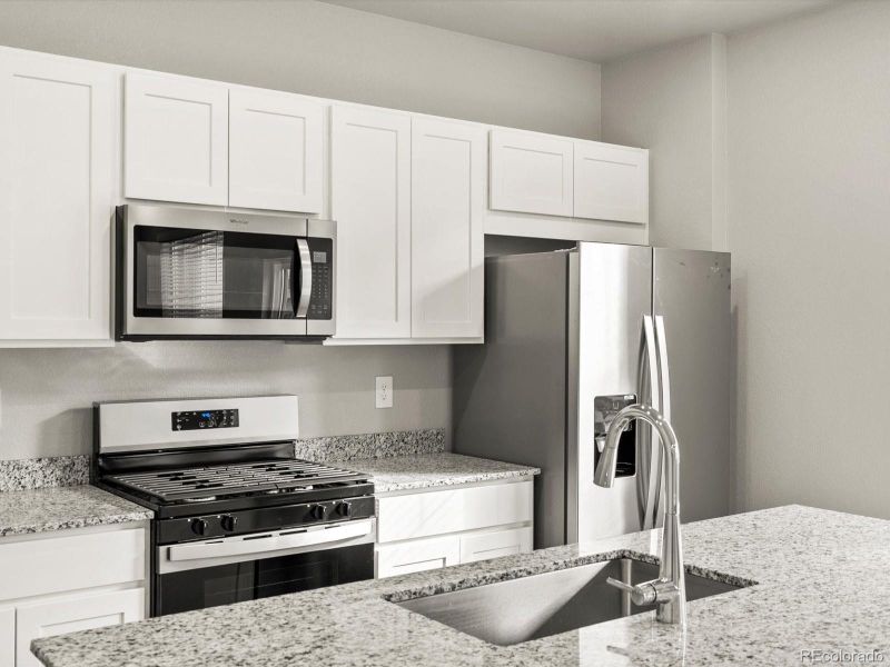 Furnished interior view inside a new home in Lake Bluff, Greeley (Image 8).