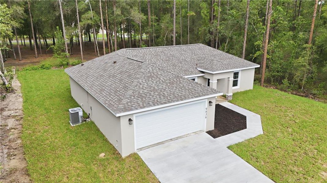Exterior details and patio area of a home in , Citrus Springs (Image 30).