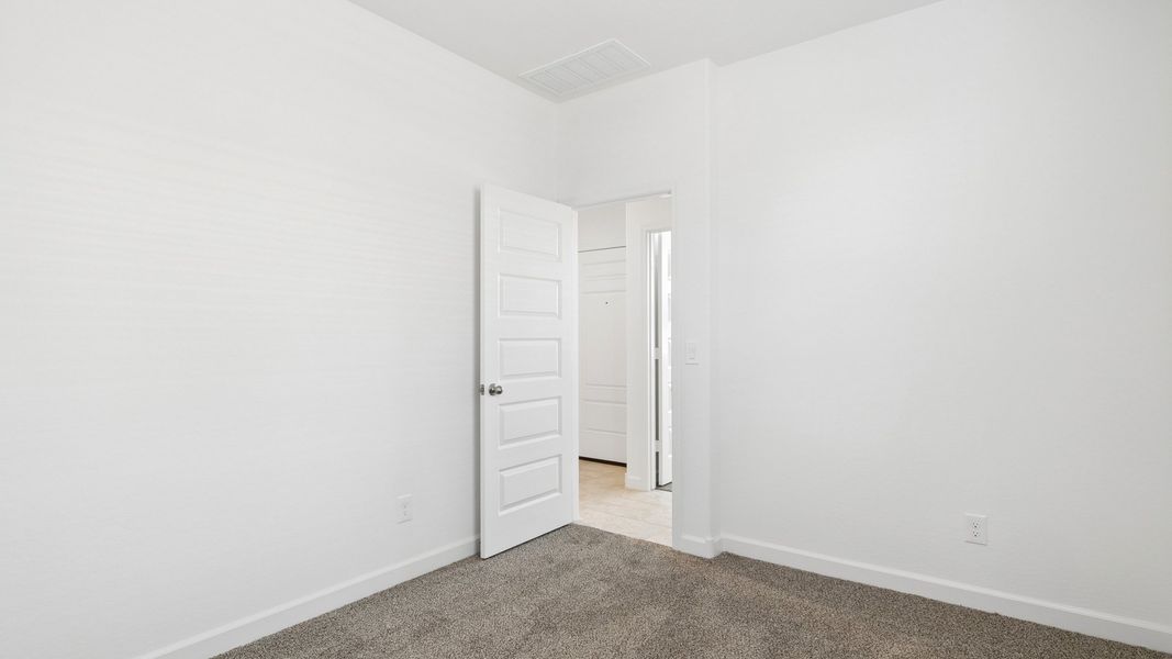 Representative unfurnished interior of a home built from the Raven by D.R. Horton in Magma Ranch Vistas, Florence (Image 17).