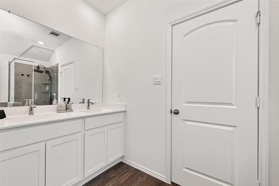 Furnished interior view inside a new home in Sunterra, Katy (Image 7).