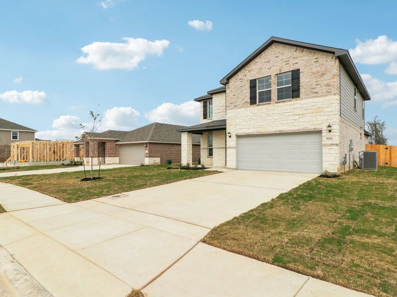 Front exterior of the Medina floorplan at a Meritage Homes community. Front exterior of the Medina floorplan at a Meritage Homes community.