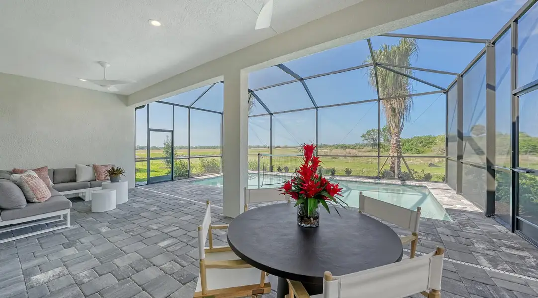 Exterior details and patio area of a home in Vistera of Venice, Nokomis (Image 3).