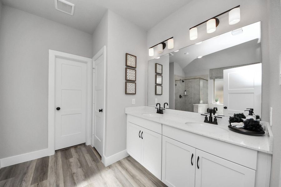 Furnished interior view inside a new home in Sunterra: Landmark Collection, Katy (Image 29).