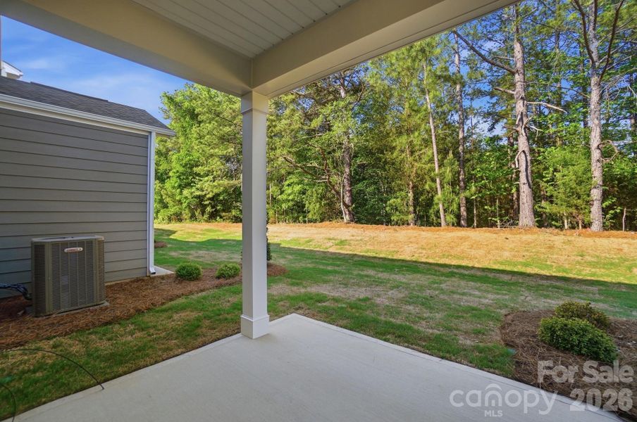 Exterior details and patio area of a home in Blythe Mill Townhomes, Waxhaw (Image 3). Exterior details and patio area of a home in Blythe Mill Townhomes, Waxhaw (Image 3).