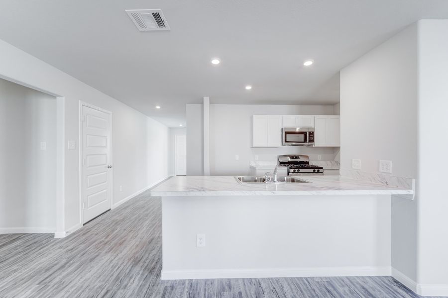 Representative furnished interior of a home built from the Jefferson by National HomeCorp in Canal Walk, Roanoke Rapids (Image 11).
