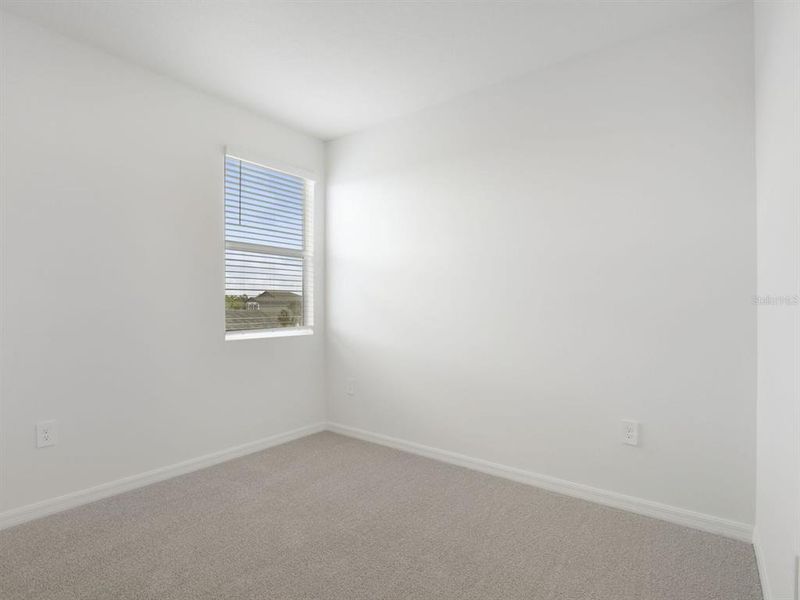 Spacious, unfurnished interior of a new home in Coasterra - Reserve Series, Palmetto (Image 21).