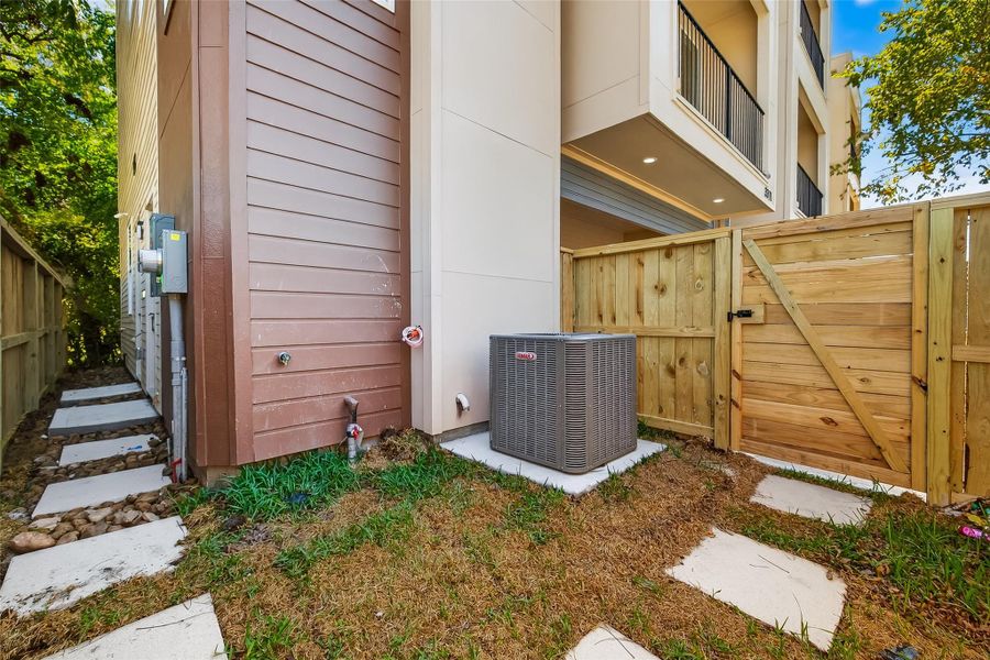 Exterior details and patio area of a home in , Houston (Image 4).