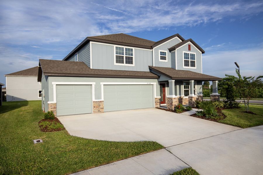 Representative exterior photo of a completed home built from the Carlisle by Maronda Homes in Benton Hills, Brooksville, FL (Image 24).