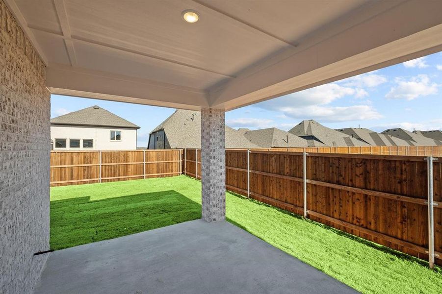 Exterior details and patio area of a home in Sandbrock Ranch, Aubrey (Image 2). Exterior details and patio area of a home in Sandbrock Ranch, Aubrey (Image 2).