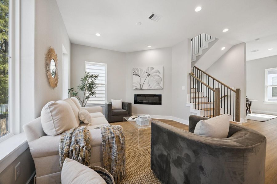 Living room with electric fireplace, a rare feature Living room with electric fireplace, a rare feature