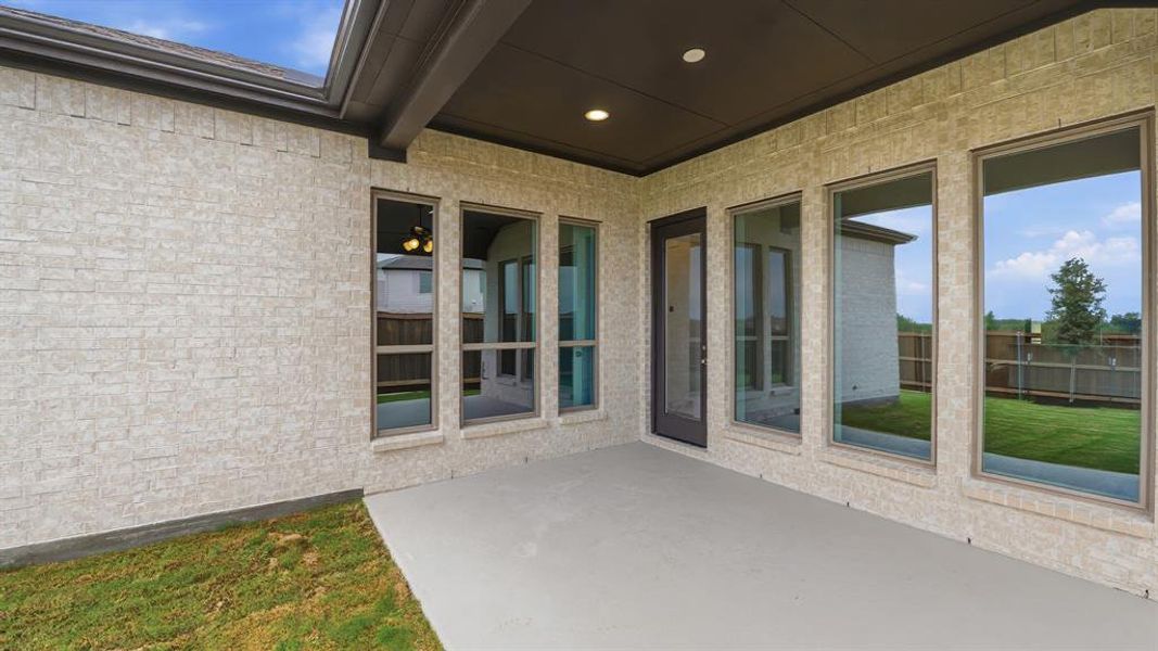 Exterior details and patio area of a home in Meraki, Forney (Image 2).