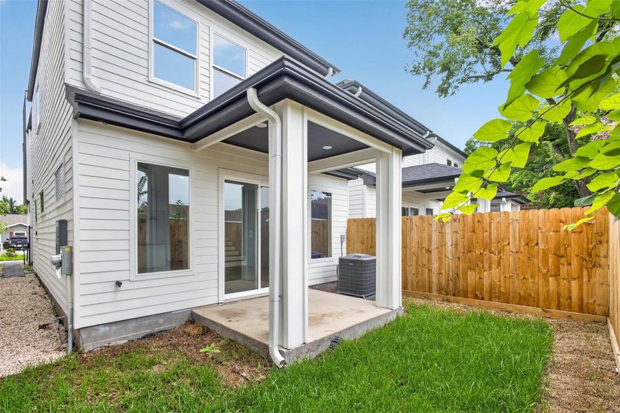 Exterior details and patio area of a home in , Houston (Image 3).