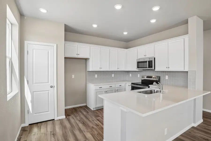 Furnished interior view inside a new home in Windler, Aurora (Image 4).