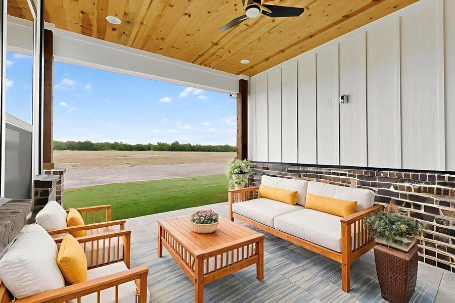 View of patio / terrace with outdoor lounge area and a ceiling fan View of patio / terrace with outdoor lounge area and a ceiling fan