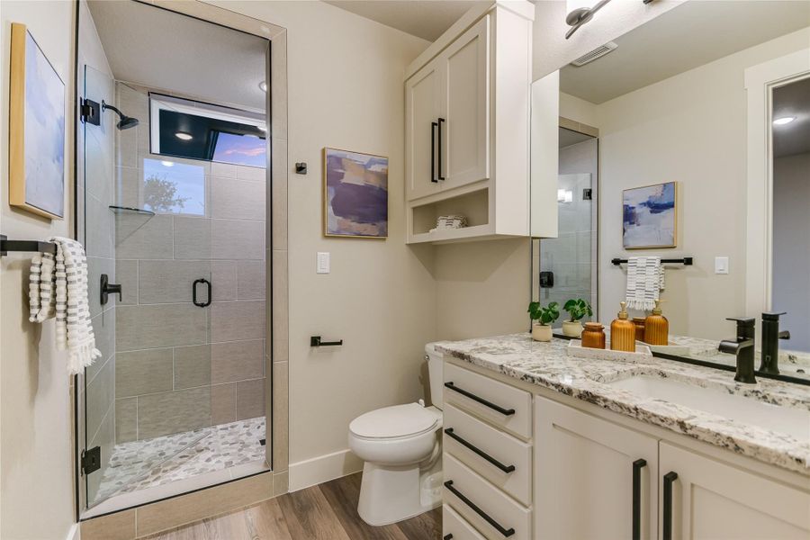 Full bathroom featuring vanity an walk-in shower Full bathroom featuring vanity an walk-in shower