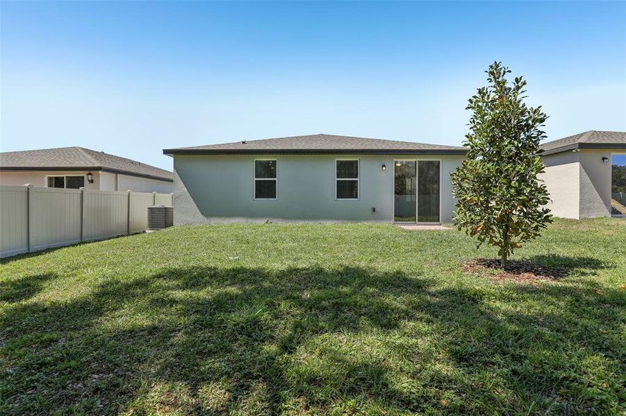 Exterior details and patio area of a home in Lawson Dunes - Signature Series, Haines City (Image 25).