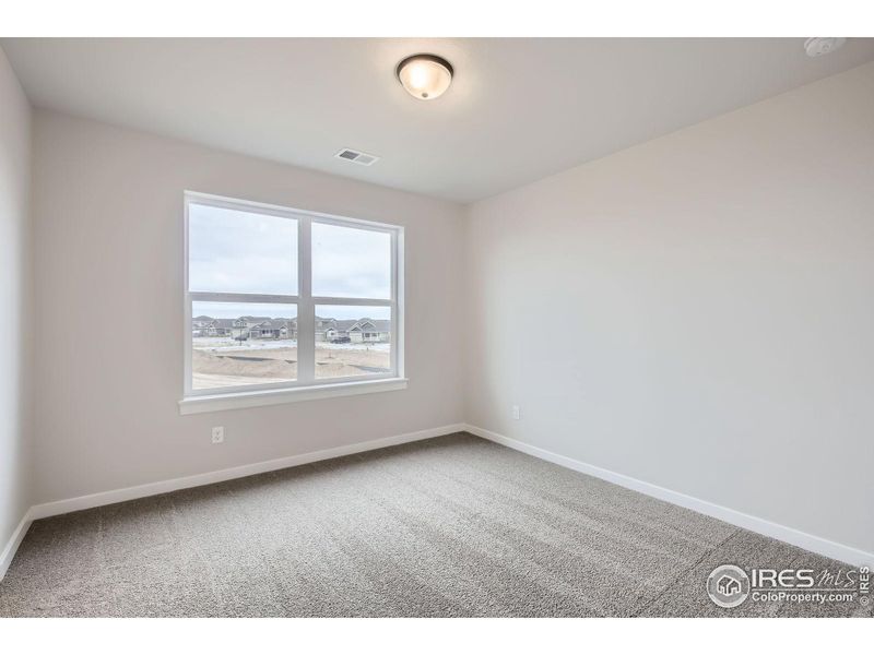 Spacious, unfurnished interior of a new home in RainDance - 60s, Windsor (Image 20).