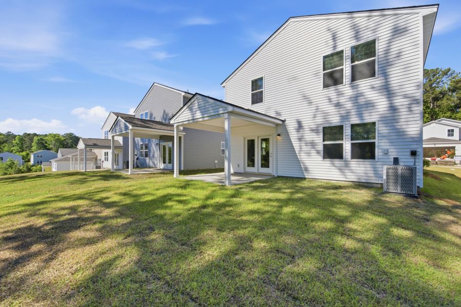 Exterior details and patio area of a home in Grand Arbor, Blythewood (Image 3).
