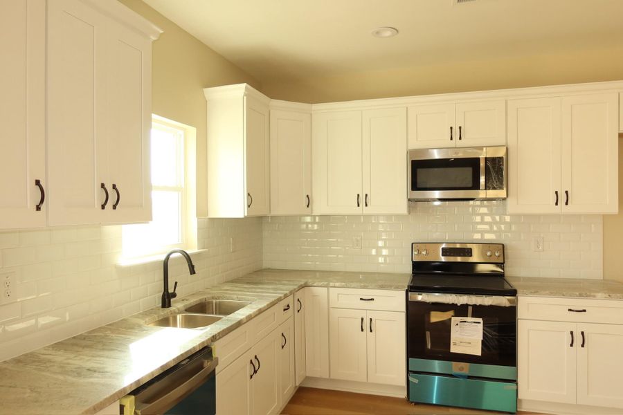Furnished interior view inside a new home in , Santee (Image 6).