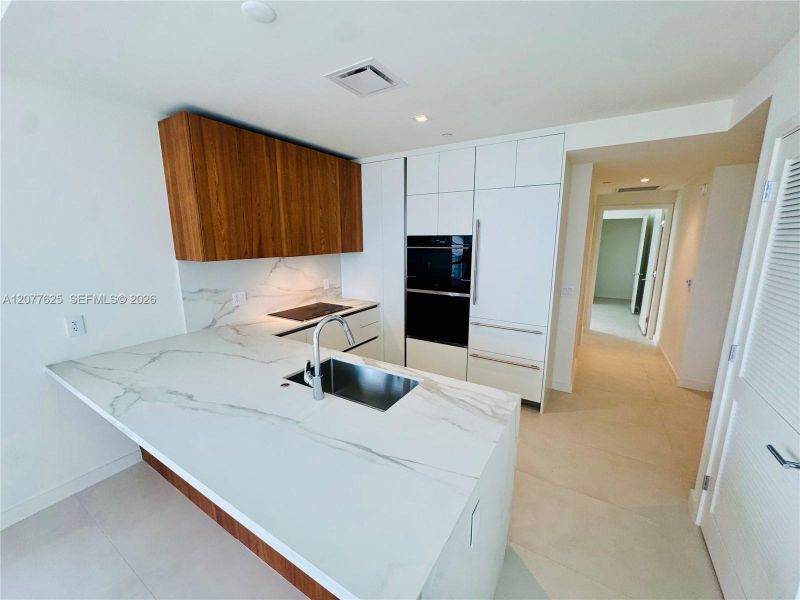 Furnished interior view inside a new home in , Miami (Image 7). Furnished interior view inside a new home in , Miami (Image 7).