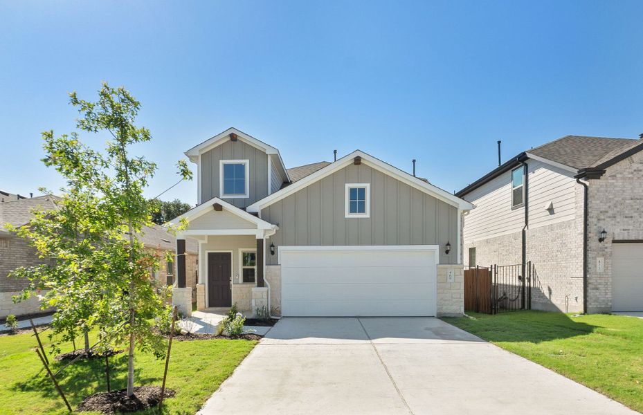 Front exterior of a new home in Saddleback at Santa Rita Ranch, Liberty Hill, TX, highlighting curb appeal (Image 22).